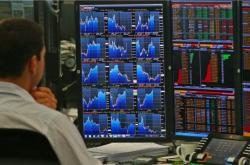 Χρηματιστήρια: Η Ευρώπη γιορτάζει τα Χριστούγεννα με ρεκόρ - Ισορροπία μεταξύ κερδών και απωλειών στη Wall Street