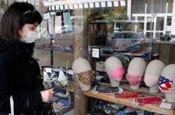 Όχι στις υφασμάτινες μάσκες λέει η Γαλλία - Συνιστά μάσκες υψηλής αναπνευστικής προστασίας