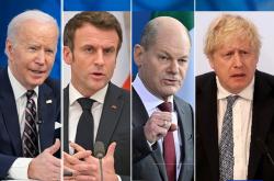 Ο πρόεδρος Μπάιντεν και οι ηγέτες Γαλλίας, Γερμανίας και Βρετανίας αυξάνουν το τίμημα που θα πληρώσει η Ρωσία