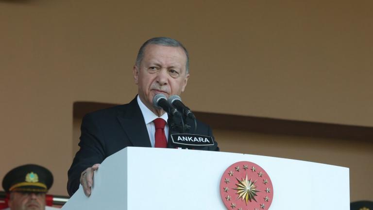 ERDOGAN T